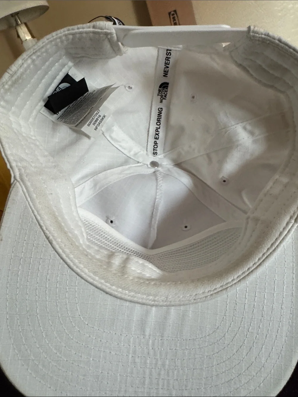 The North Face White Baseball Cap with Rainbow Logo Accent
